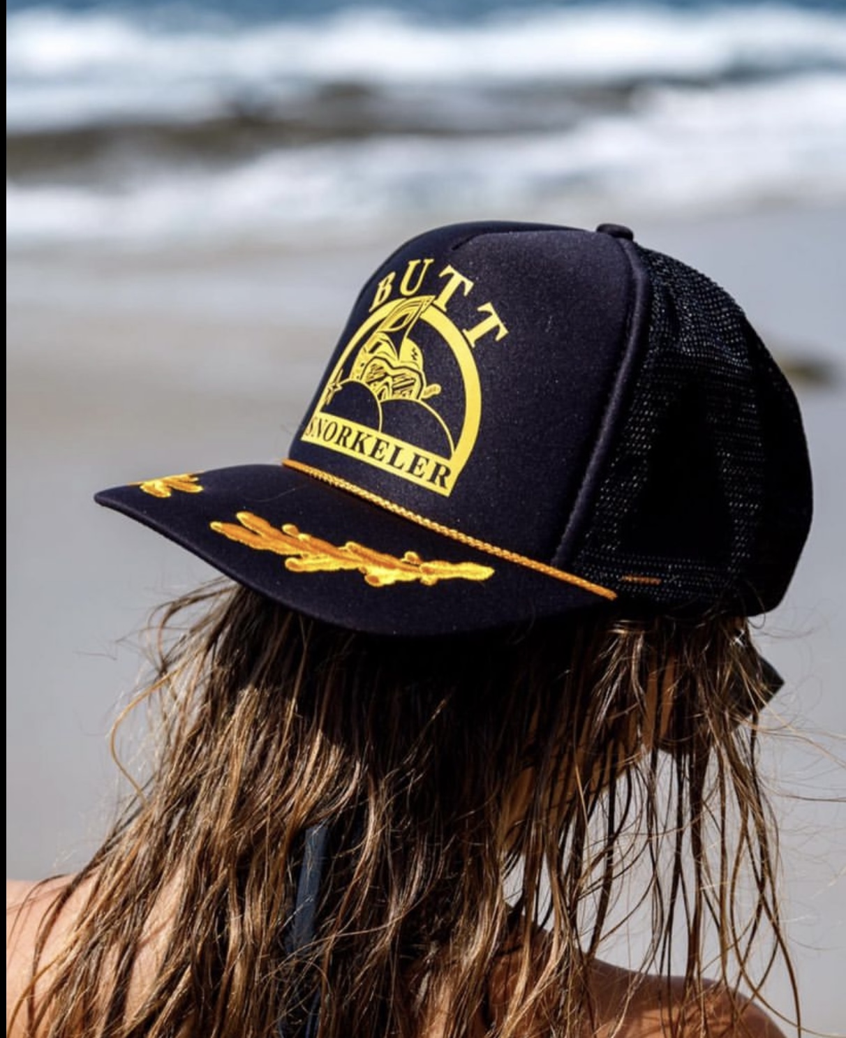 Butt Snorkeler cap at the beach